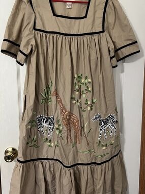 Bechamel African Beige Maxi Dress with Black Trim and Animal Embroidery